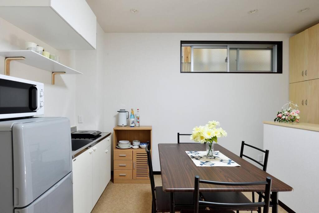 Keimei Guest House Osaka Bagian luar foto