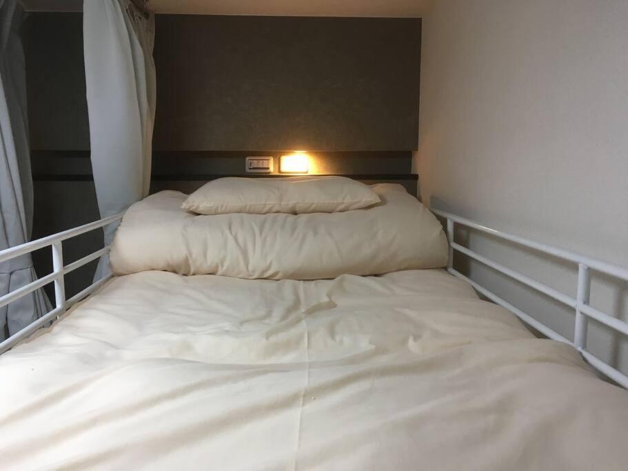 Keimei Guest House Osaka Bagian luar foto