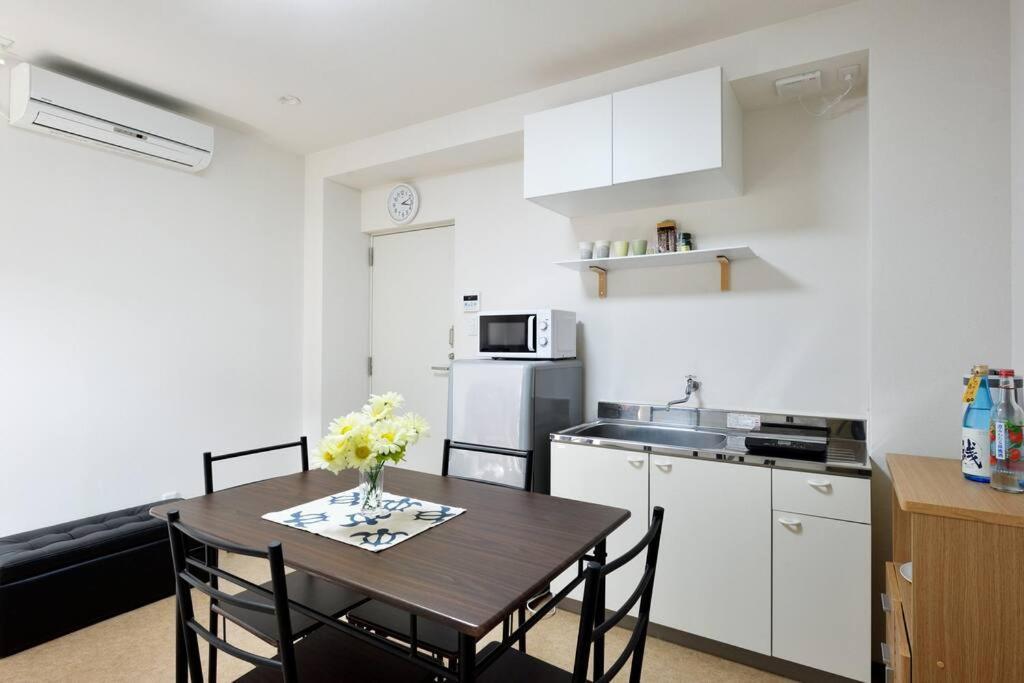 Keimei Guest House Osaka Bagian luar foto
