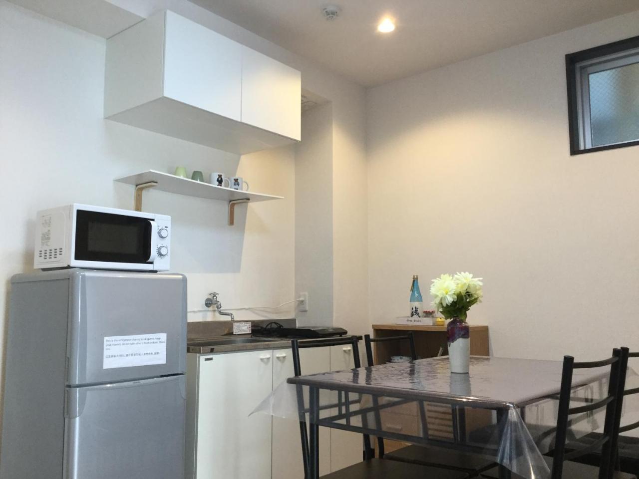 Keimei Guest House Osaka Bagian luar foto